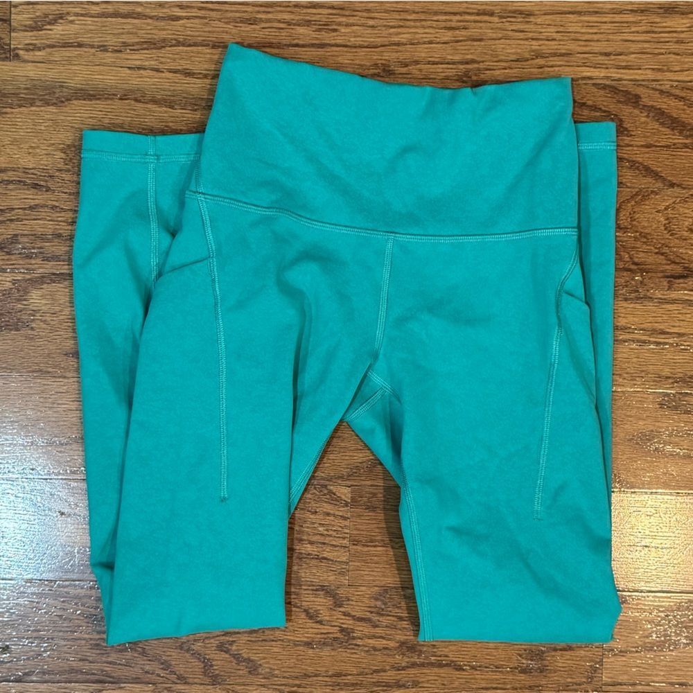 EUC Lululemon Wunder Train High-Rise Tight Pockets 25" Blaze Maldives Green sz 4